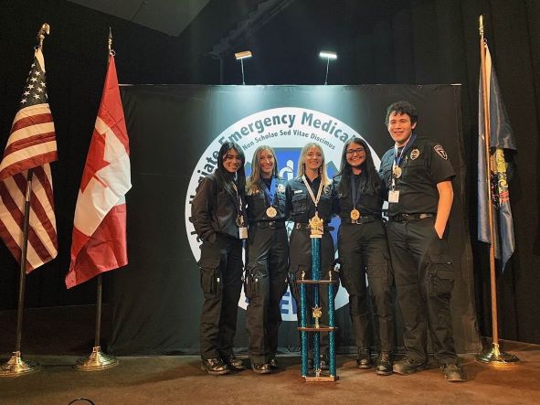 UCLA EMT team with trophy at the place at the National Collegiate Emergency Medical Services Foundation Conference