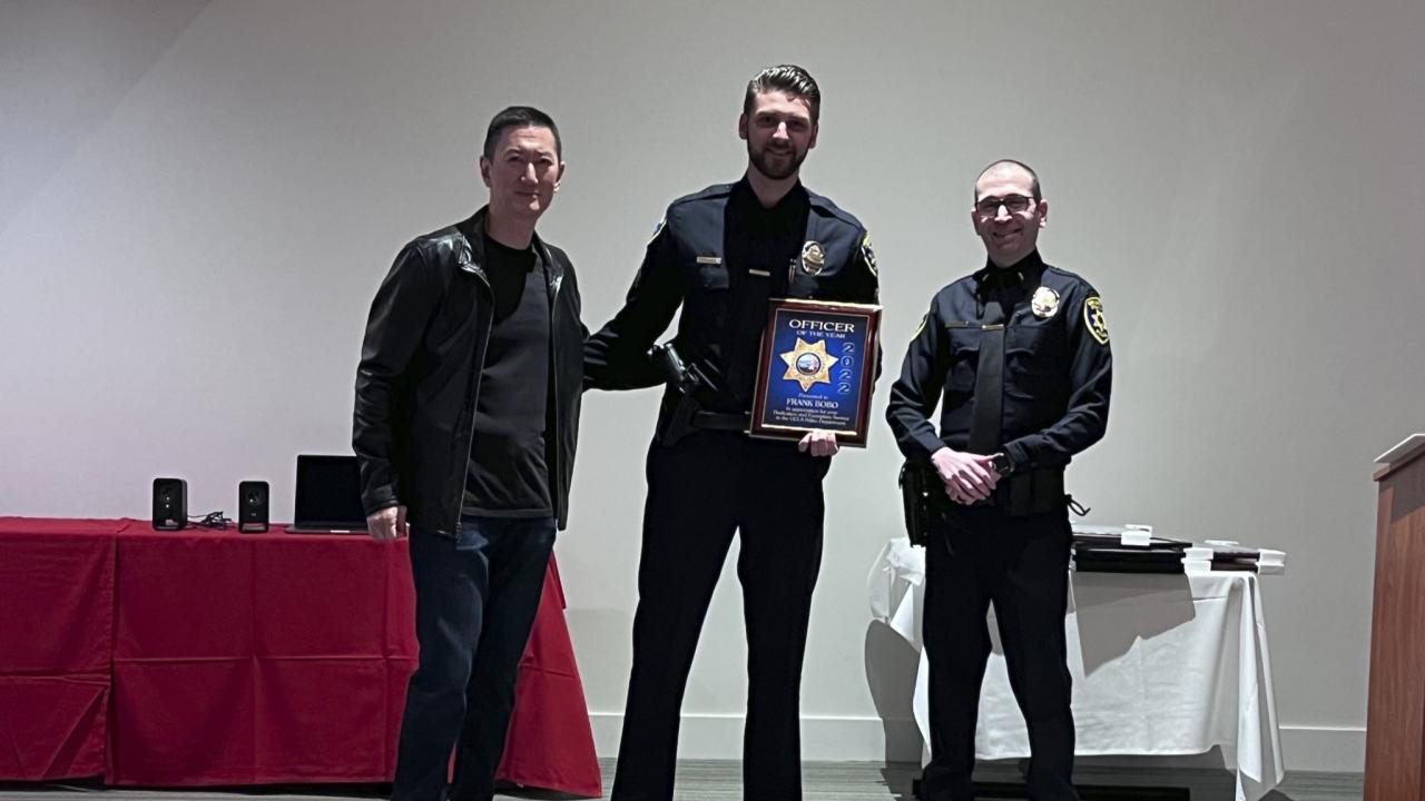 Officer Frank Bobo with the Officer of the Year Award